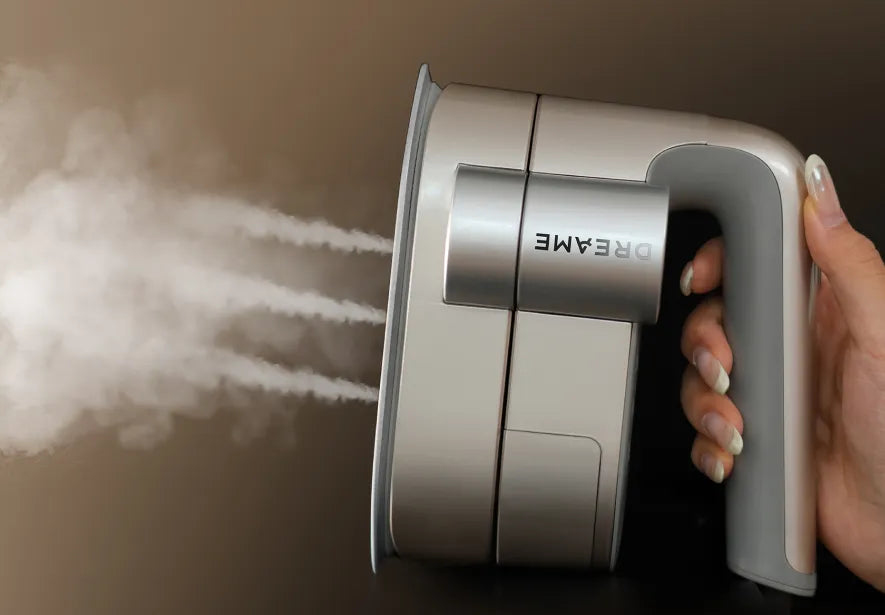 Hand holds, steam on